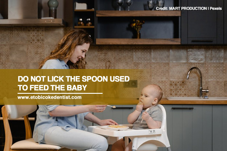 Do not lick the spoon used to feed the baby